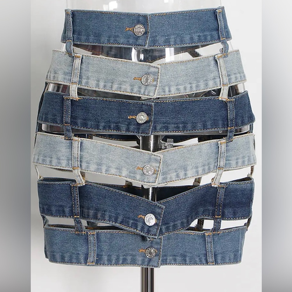 This denim skirt is perfect for fall and or summer styling. New, never worn!